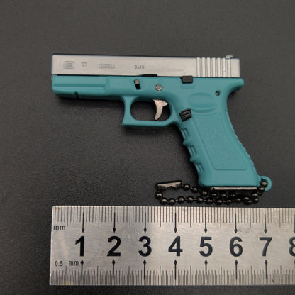New Empire 1:3 Glock G17 alloy keychain, realistic gun model with detachable soldier gear & bullets. - Moze