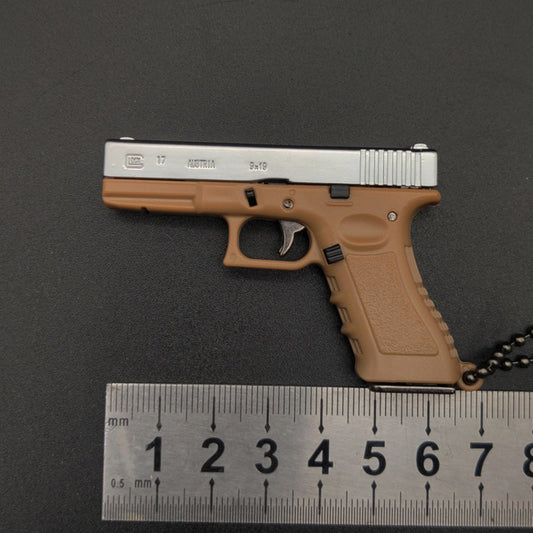 New Empire 1:3 Glock G17 alloy keychain, realistic gun model with detachable soldier gear & bullets. - Moze