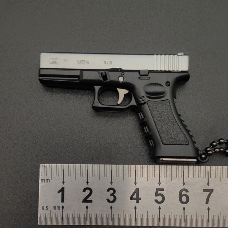 New Empire 1:3 Glock G17 alloy keychain, realistic gun model with detachable soldier gear & bullets. - Moze