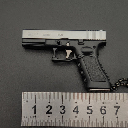 New Empire 1:3 Glock G17 alloy keychain, realistic gun model with detachable soldier gear & bullets. - Moze